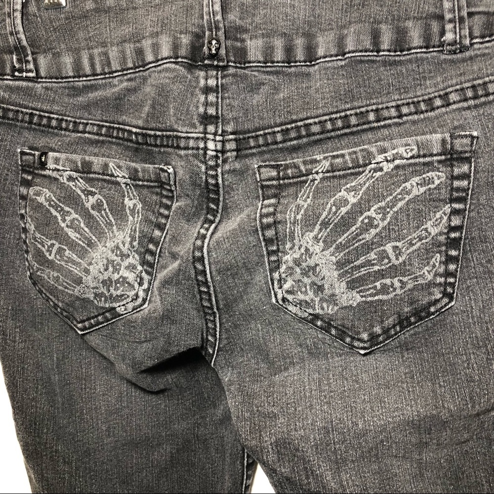 Lovesick black skeleton hands skinny jeans